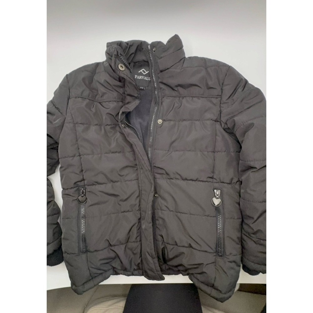 Girls size 7/8 black jacket. Really warm jacket. Excellent condition.